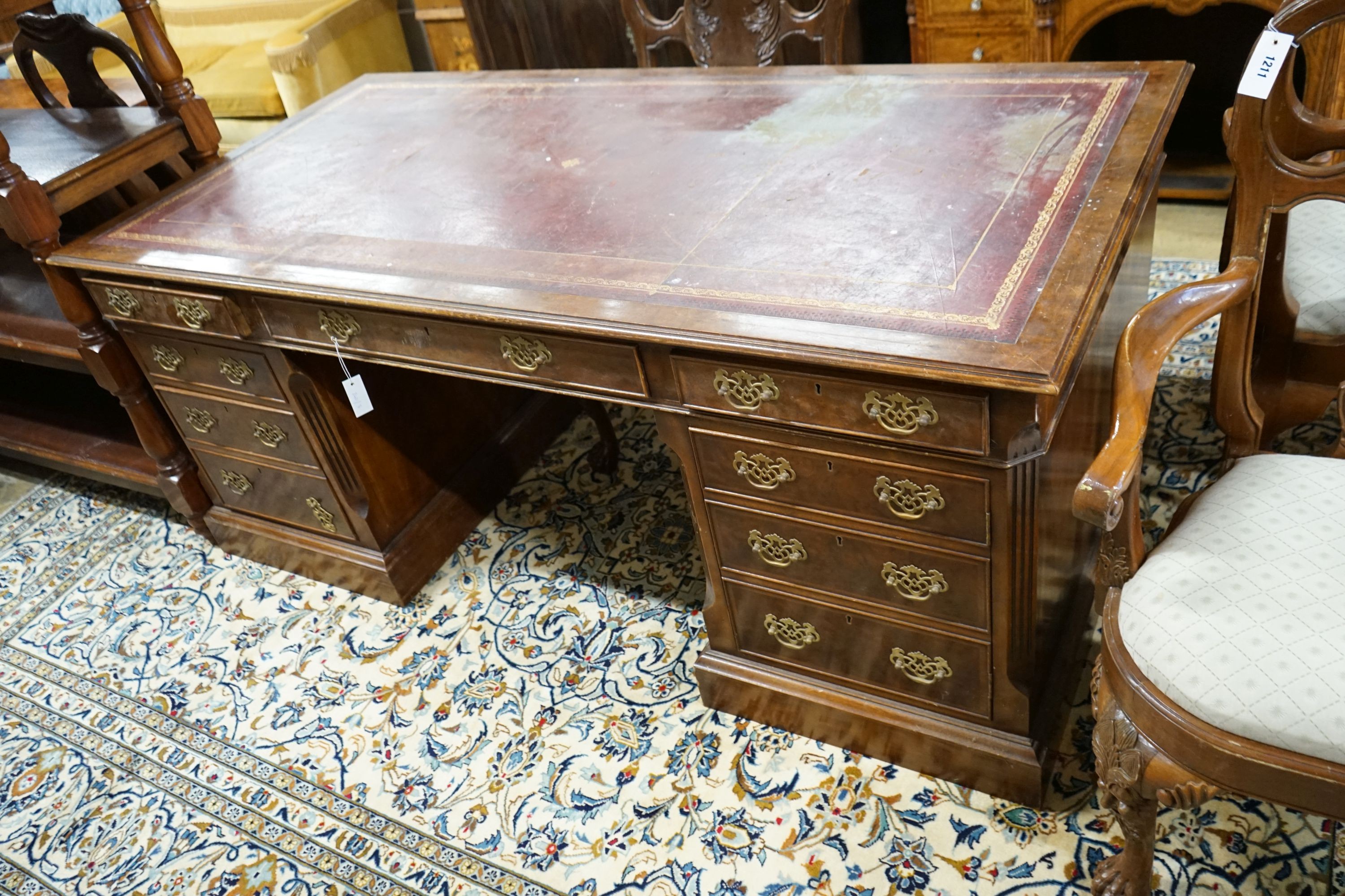 A George III style mahogany pedestal partner's desk, length 182cm, depth 91cm, height 76cm